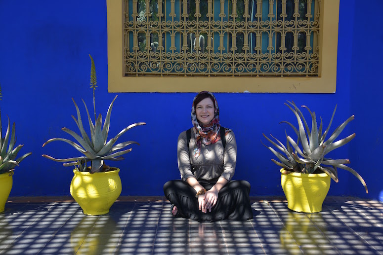 Posing for a picture at the Majorelle Garden in Marrakesh.